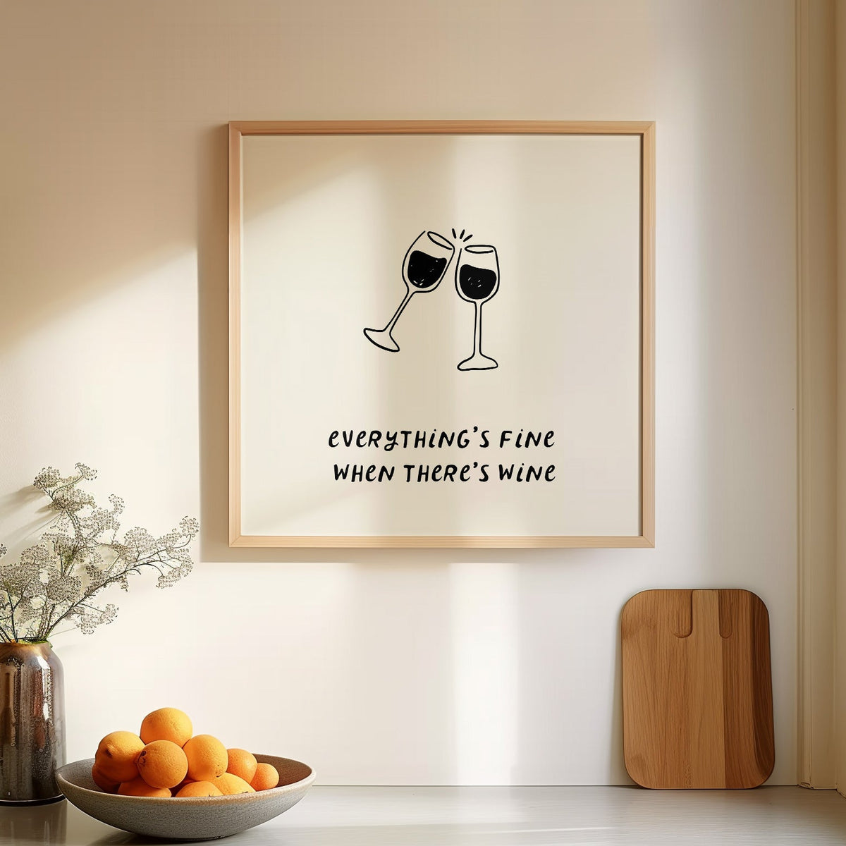 Square print with a hand-drawn illustration of two wine glasses clinking together, and the quote "everything's fine when there's wine" in bold black lettering below.
