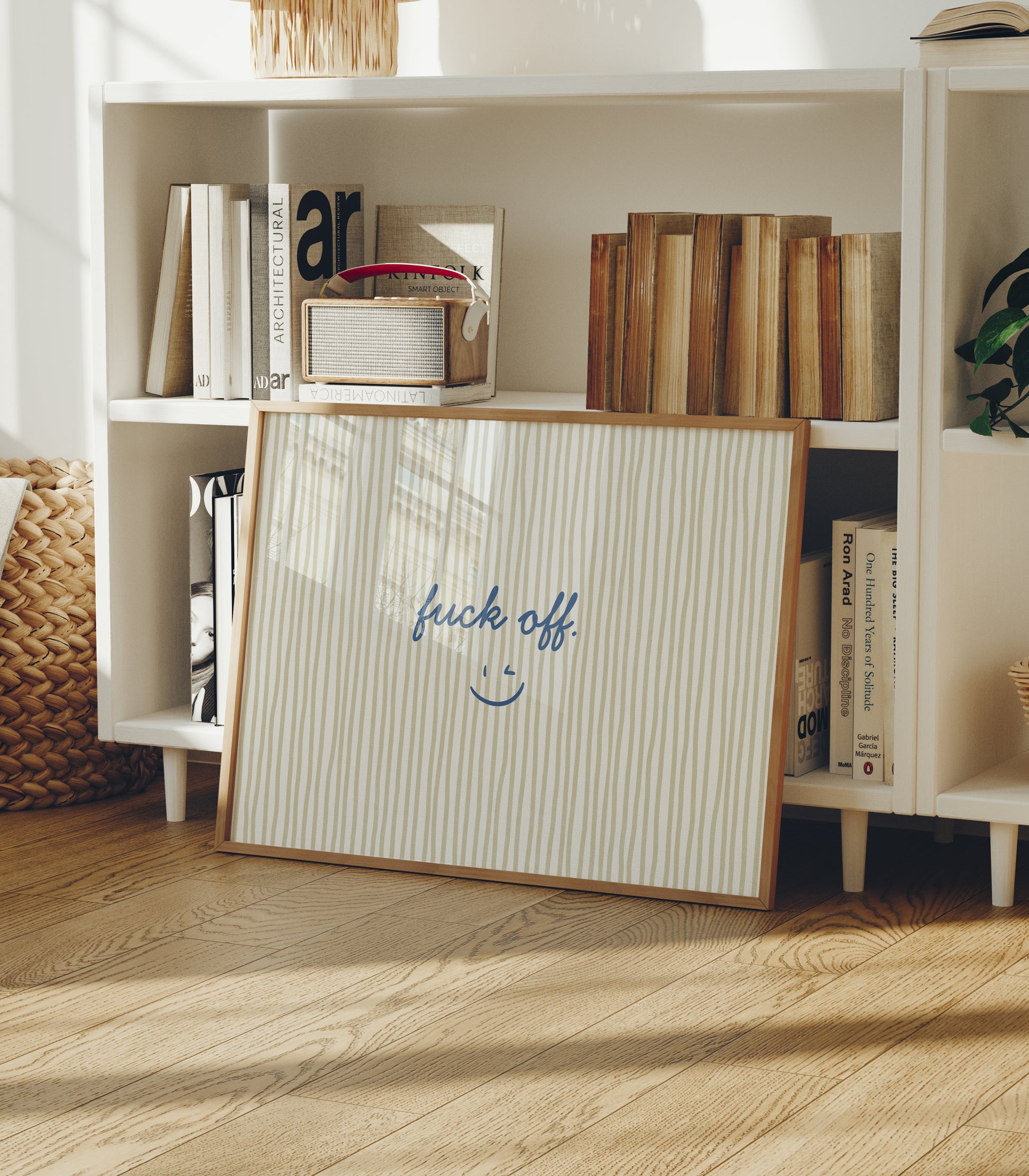 Beige and olive vertical striped print with "fuck off." in navy script and a small winking smiley face