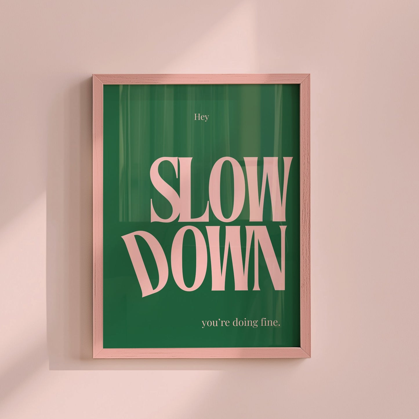 Green art with pink text " Slow Down You're Doing Fine "