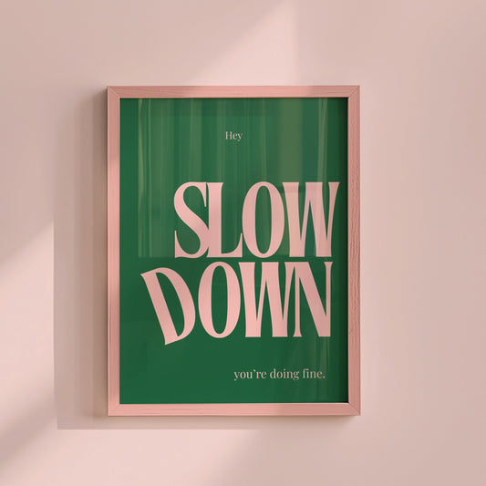 Green art with pink text " Slow Down You're Doing Fine "