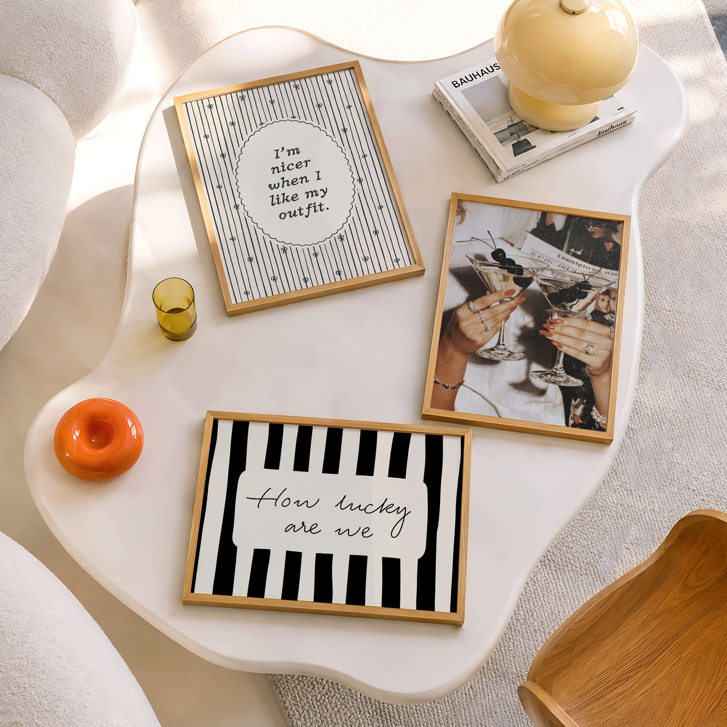 Set of 3 vintage fashion editorial prints: a photograph of two hands clinking martini glasses garnished with cherries, "I'm nicer when I like my outfit" in a scalloped oval frame, and "How lucky are we" on bold black and white stripes.
