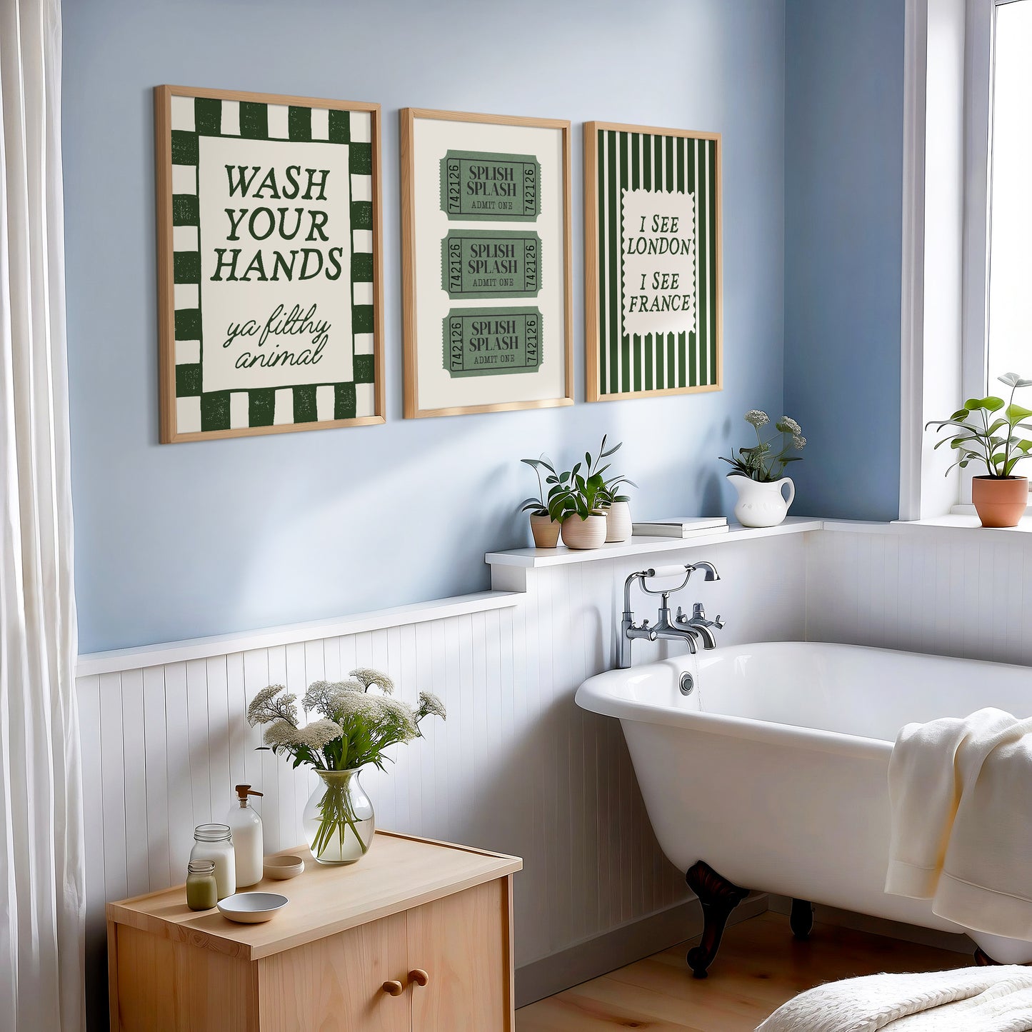 Set of 3 green bathroom prints: "Wash your hands ya filthy animal" in green cursive bordered by a green and cream checkered frame, three green ticket-stub illustrations reading "Splish Splash, Admit One," and "I See London I See France" in a scalloped stamp frame on green and cream stripes.