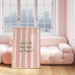 Print with soft pink hand-painted brush stroke stripes and the quote "What's the best that can happen" in script lettering.