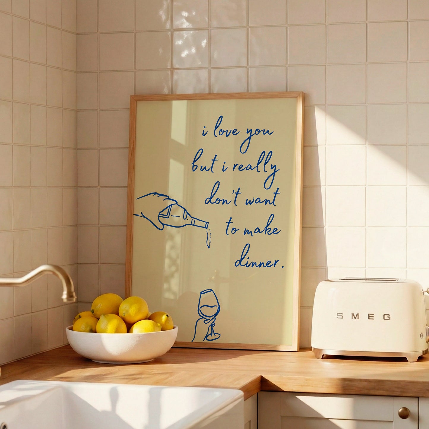 Vertical cream wall print with navy blue cursive script reading i love you but i really don't want to make dinner with hand-drawn line art of a pouring wine bottle and a wine glass