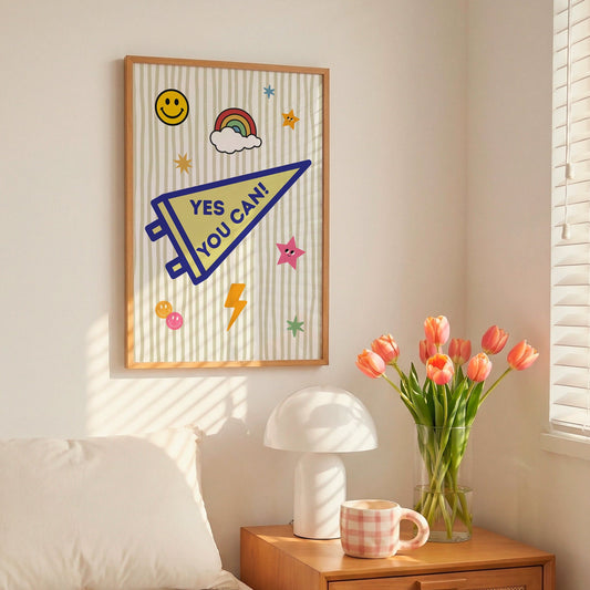 Woman hanging Yes You Can pennant art print on bedroom wall — whimsical varsity motivational dorm room wall decor