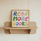 Square print with the words "Read More Books" in large multicolored bubble letters — blue, yellow, pink, green, red, and orange — stacked on three lines against a cream background.