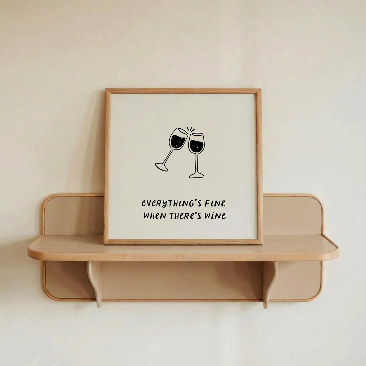 Square print with a hand-drawn illustration of two wine glasses clinking together, and the quote "everything's fine when there's wine" in bold black lettering below.