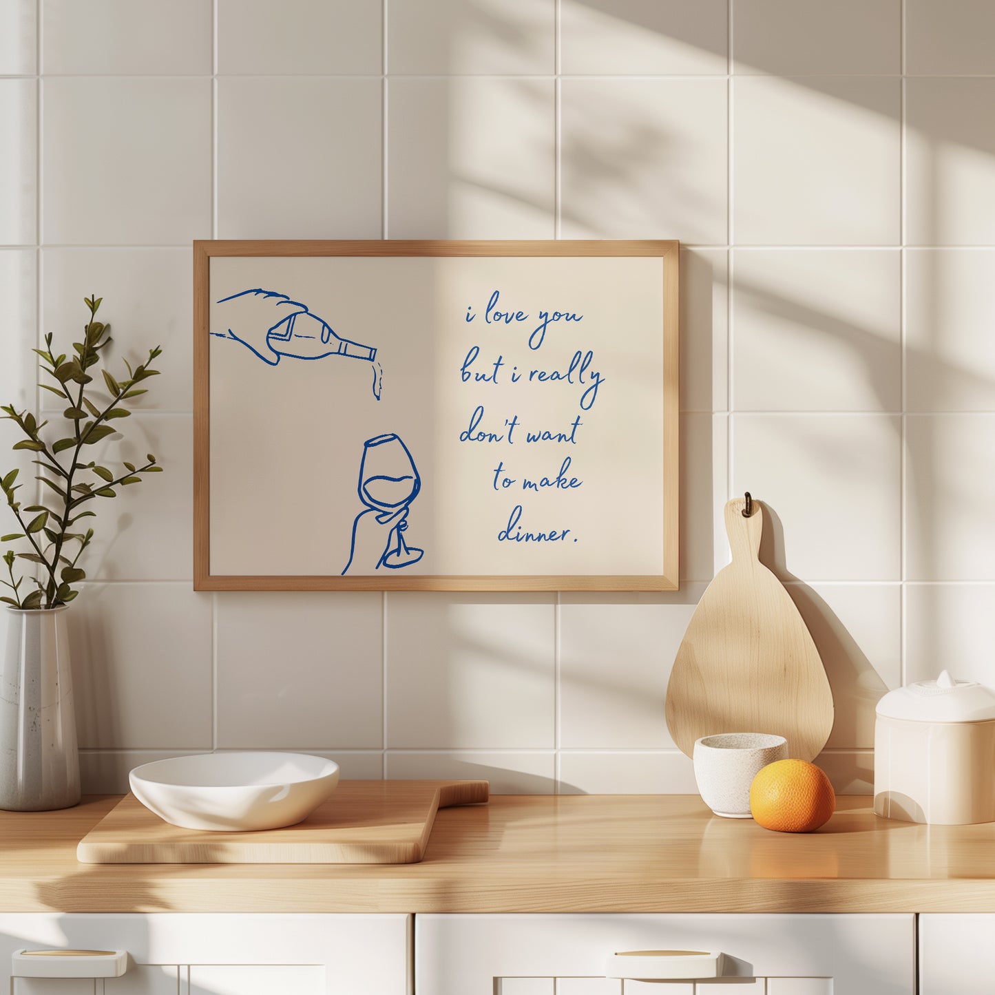 Print with hand-drawn blue line art of a bottle pouring wine into a glass beside the cursive quote "i love you but i really don't want to make dinner."