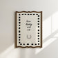 Cream print with a black dashed border featuring the handwritten quote 'how lucky are we' and a horseshoe illustration