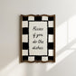 Black and white checkered print with a scalloped border and the handwritten quote "Kisses if you do the dishes" in black script