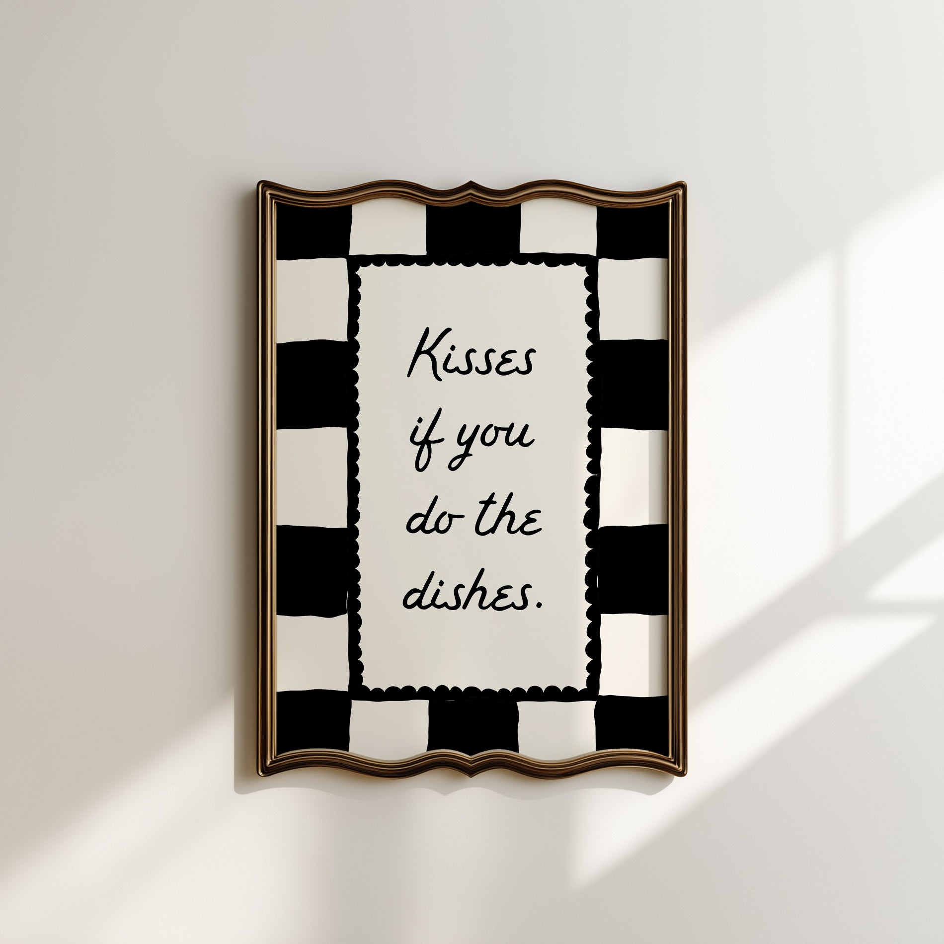 Black and white checkered print with a scalloped border and the handwritten quote "Kisses if you do the dishes" in black script