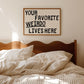 Horizontal quote art print reading 'Your Favorite Weirdo Lives Here'