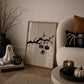 Set of 3 black and white Halloween prints: dripping "Trick or Treat" typography, "'Tis the season to be spooky" framed by skeleton hands, and a black silhouette branch with hanging jack-o'-lanterns.