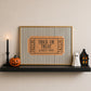 Set of five Halloween prints featuring a ghost postage stamp, bold newspaper-style lettering, a spooky season banner, a trick-or-treat ticket, and a jack-o'-lantern skeleton
