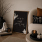 Set of 3 Halloween prints: a black background print with cartoon ghosts reading "We're so happy you're here," a checkered "Spooky Season" print, and a minimalist black spider illustration on a cream background.