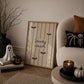 Portrait digital print with a tan and cream striped background featuring the hand-lettered phrase "Spooky season" in black script, accented with three minimalist black bat silhouettes.