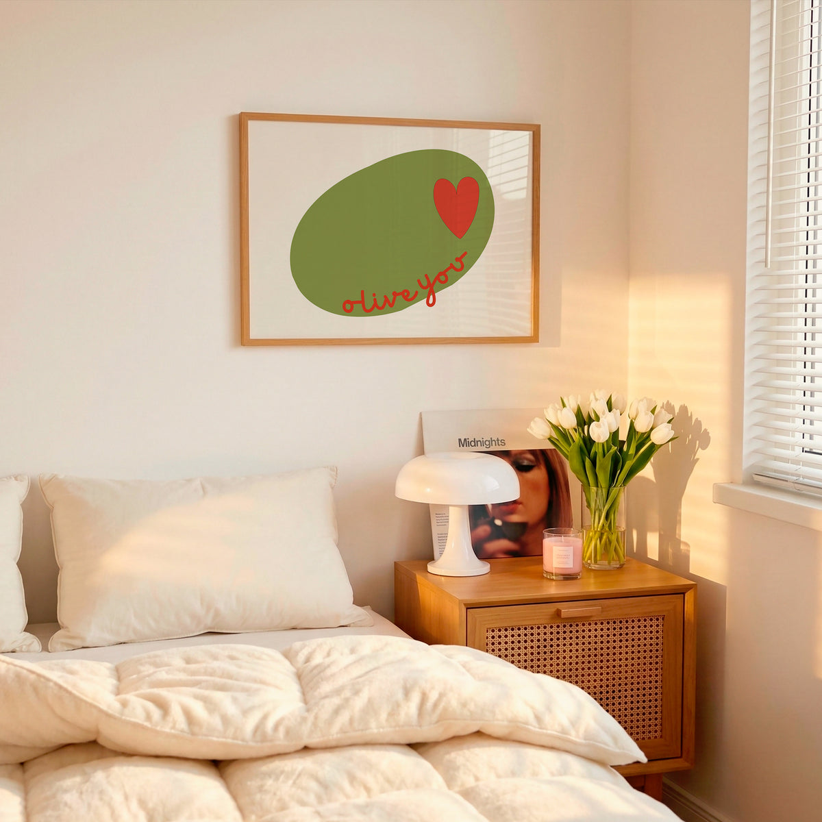 Horizontal print of a large green olive illustration with a small red heart and the words "olive you" in red cursive script, on a cream background.