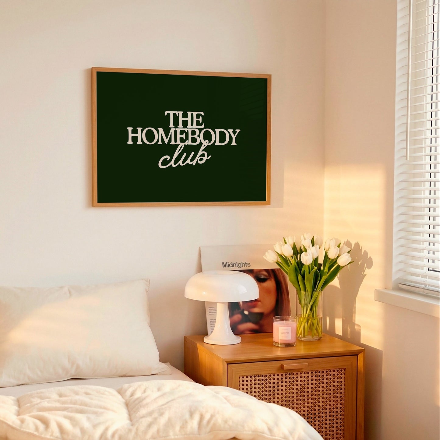 Dark green print with "The Homebody Club" in cream serif and script typography