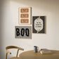 Set of 3 vintage-style Halloween prints: three "Trick or Treat, Admit One" ticket stubs, the word "BOO" in dripping black lettering, and "'Tis the season to be spooky" framed by skeleton hands on black and cream stripes.