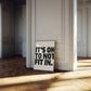 Square cream wall print with bold oversized black chunky typography reading It's Ok To Not Fit In on a clean white background