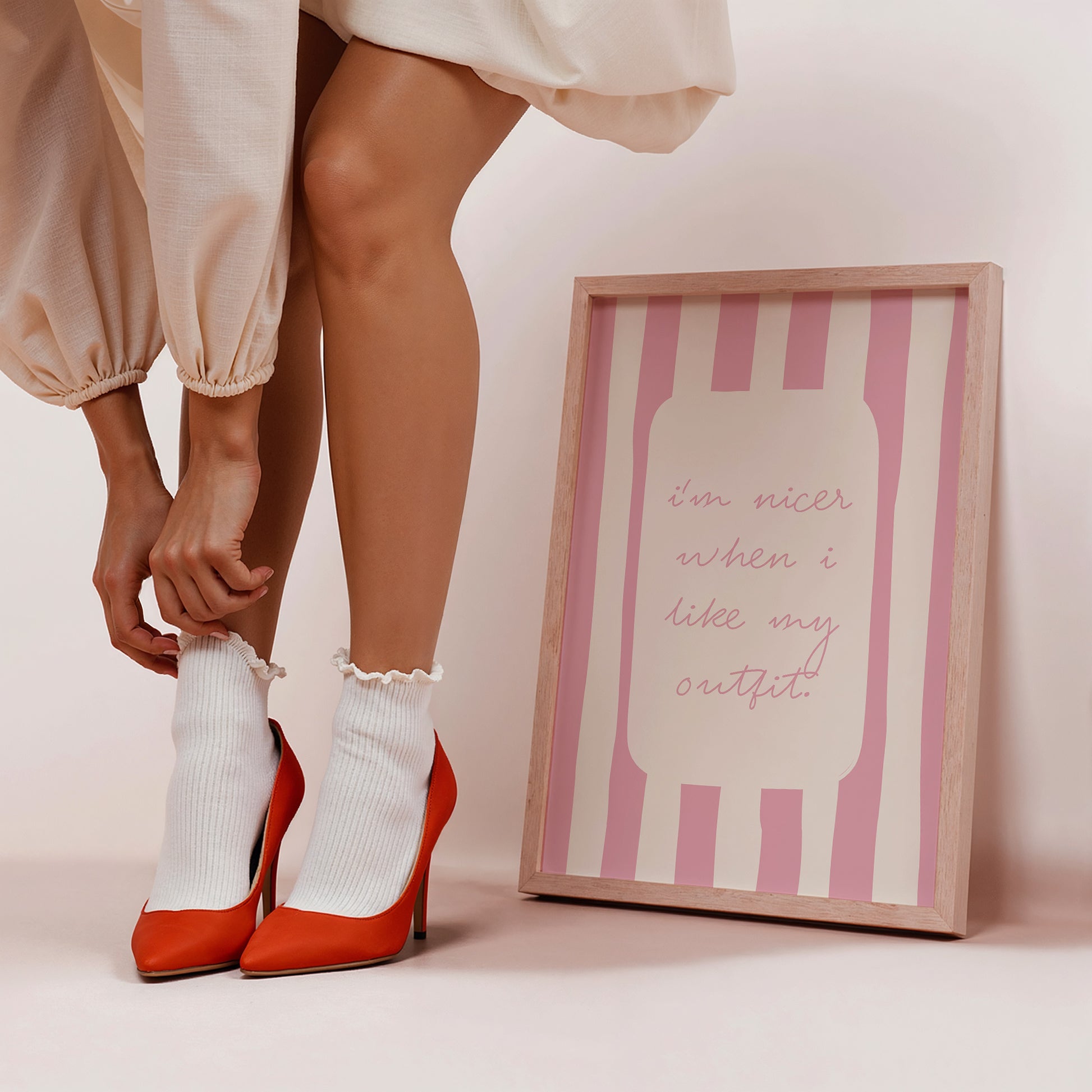 Pink and cream striped print featuring the handwritten quote "I'm nicer when I like my outfit" in pink script