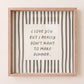 Square print with bold black and white vertical stripes framing the quote "i love you but i really don't want to make dinner" in dark gray block lettering.