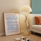 Square wall print on a warm cream background with bold periwinkle blue chunky mixed typography reading Hey! Slow down You're Fine You got this