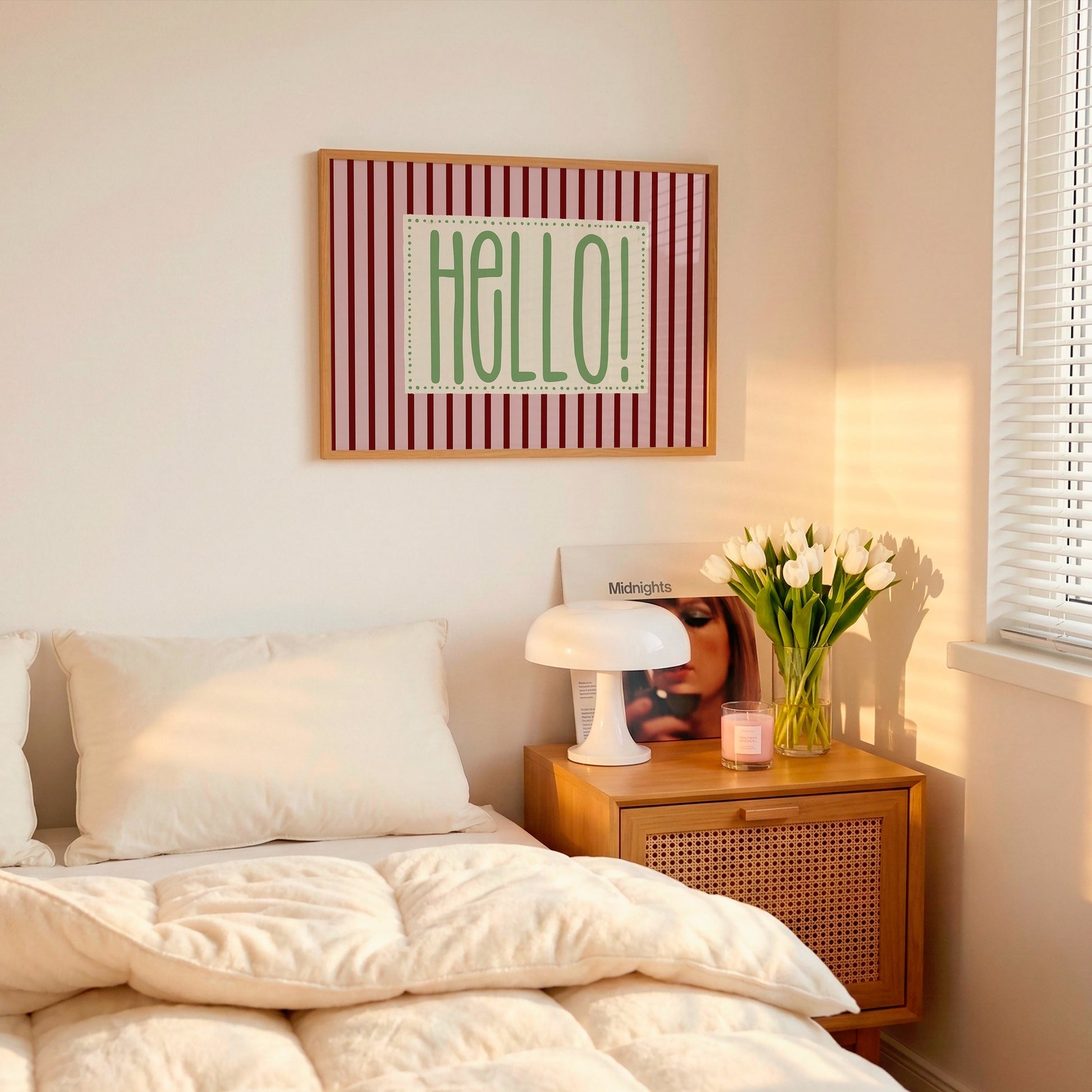 Horizontal wall print with bold dark red vertical stripes and a green dotted border text box reading Hello! in a chunky rounded font
