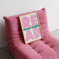 Vertical print with the word "READ" in oversized pink bubble letters and "more books" in green cursive script layered across it, on a white background.