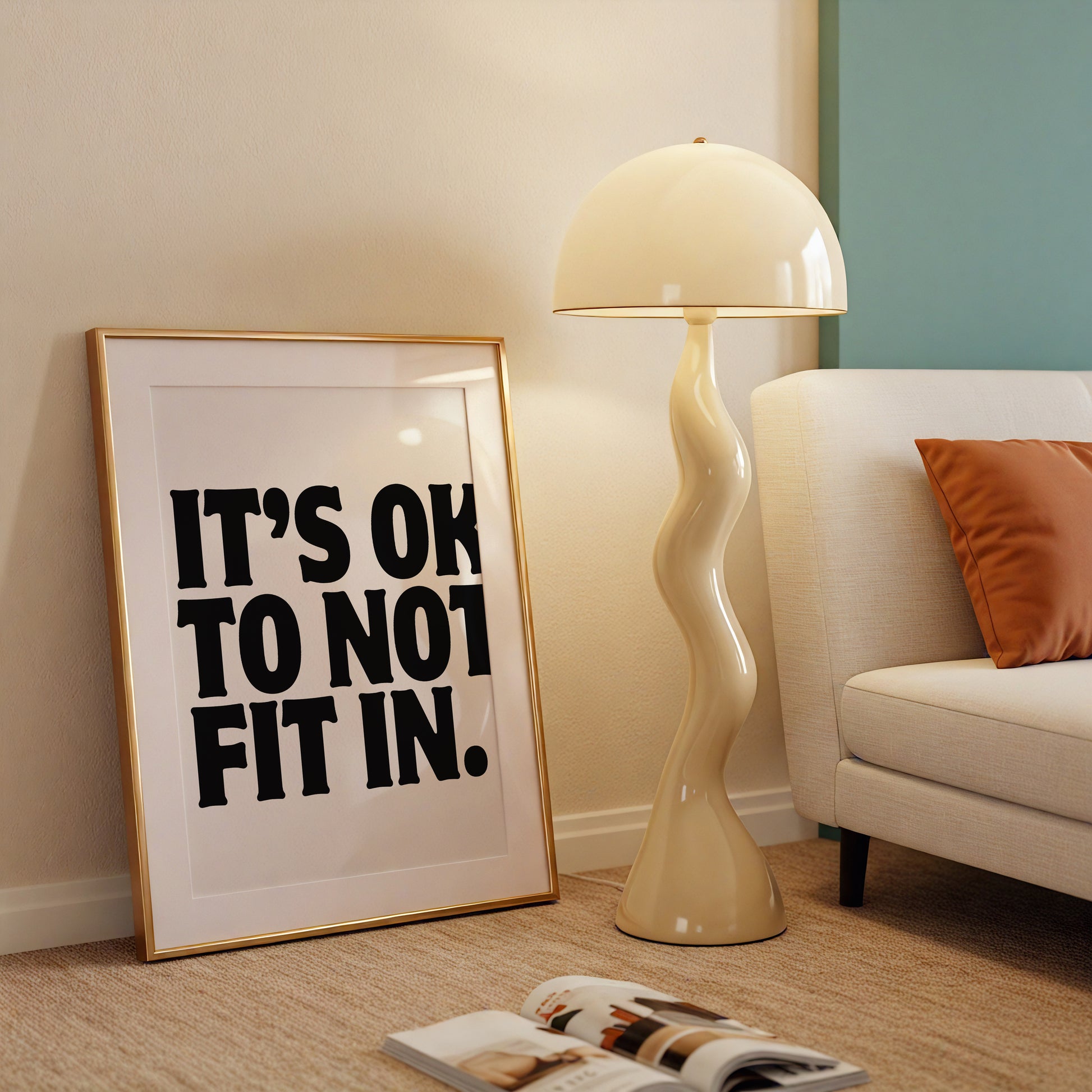 Square cream wall print with bold oversized black chunky typography reading It's Ok To Not Fit In on a clean white background