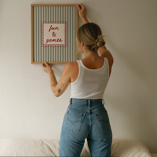 Sage green striped bold art print reading 'Fun & Games'