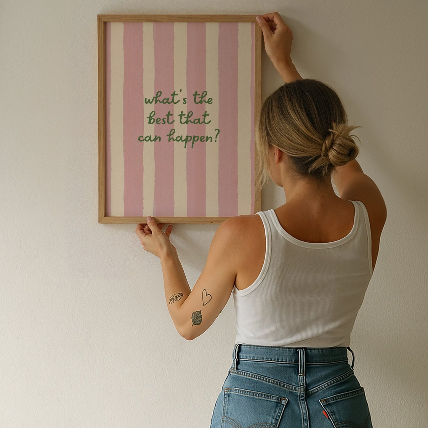 Print with soft pink hand-painted brush stroke stripes and the quote "What's the best that can happen" in script lettering.