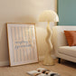 Square digital print with a cream background and blue vertical stripes, featuring the phrase "everything is figureoutable." in blue script centered on the design.