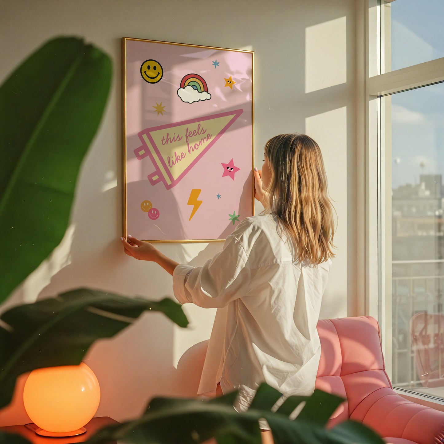 Pink dorm room gallery set of 3 — This Feels Like Home pink pennant print near sunlit window