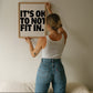 Square cream wall print with bold oversized black chunky typography reading It's Ok To Not Fit In on a clean white background