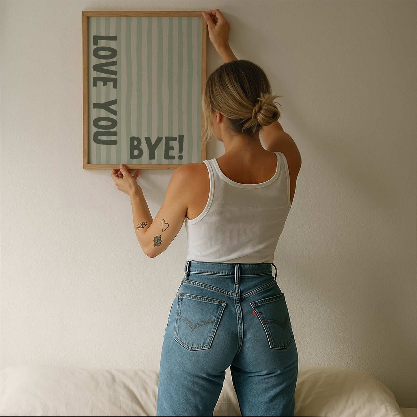 Vertical wall print with soft sage green wavy vertical stripes and bold dark green chunky typography reading LOVE YOU vertically on the left and BYE! horizontally at the bottom right