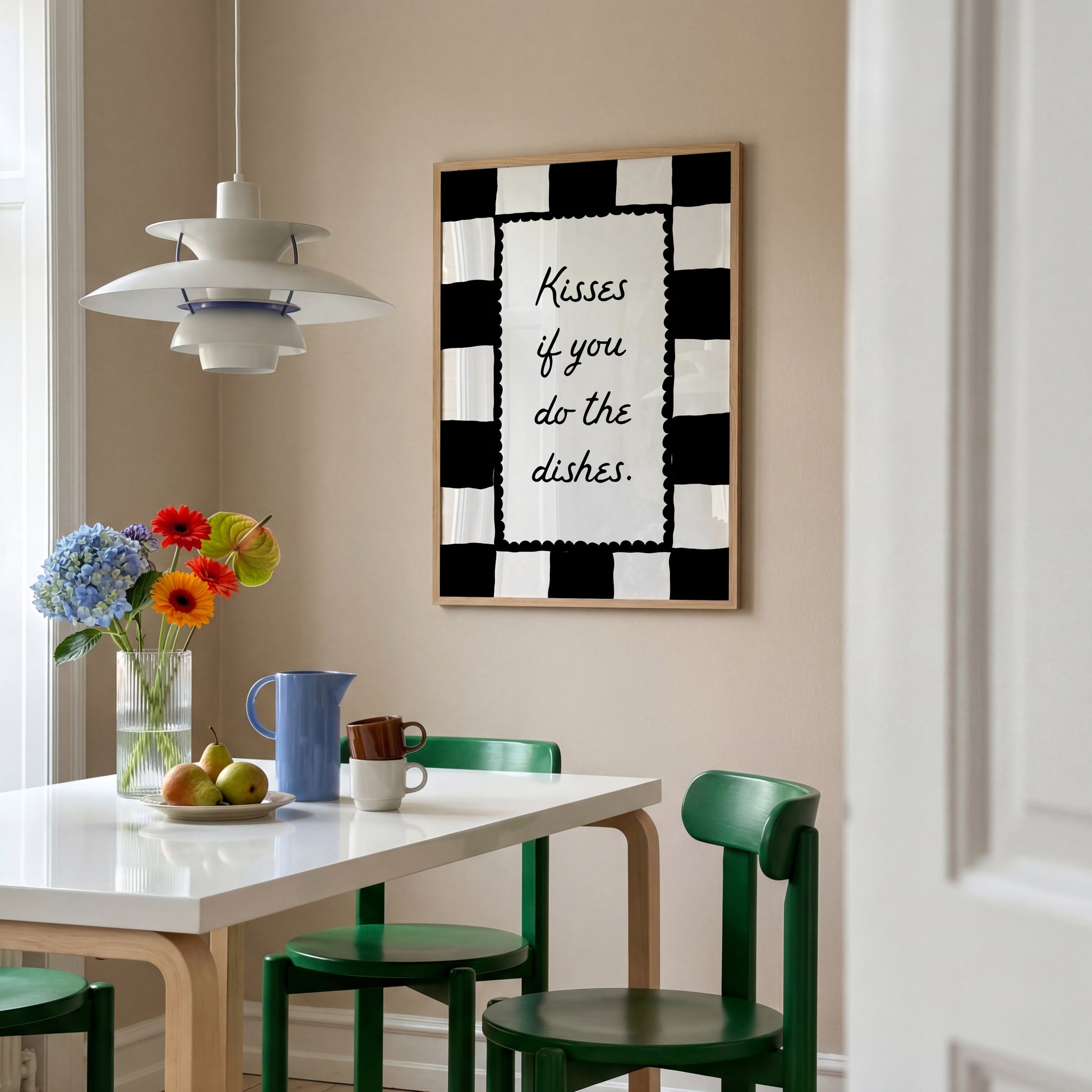 Black and white checkered print with a scalloped border and the handwritten quote "Kisses if you do the dishes" in black script