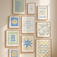 Set of 10 classroom prints in blue, green, and yellow: Yes You Can, Every Voice Matters Here, Slow Down You're Doing Fine, Progress Over Perfection, a starburst Welcome illustration, an Attendance Check print reading Show Up As You Are, Great Minds Grow Here on a checkered background, a smiley face reading Be the Kind Kid, Mistakes Help Us Learn, and Great Things Come to Those Who Try.