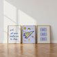Set of 3 vertical preppy blue dorm room prints featuring a cursive stripe quote, a varsity pennant with stickers, and a retro good times ticket design