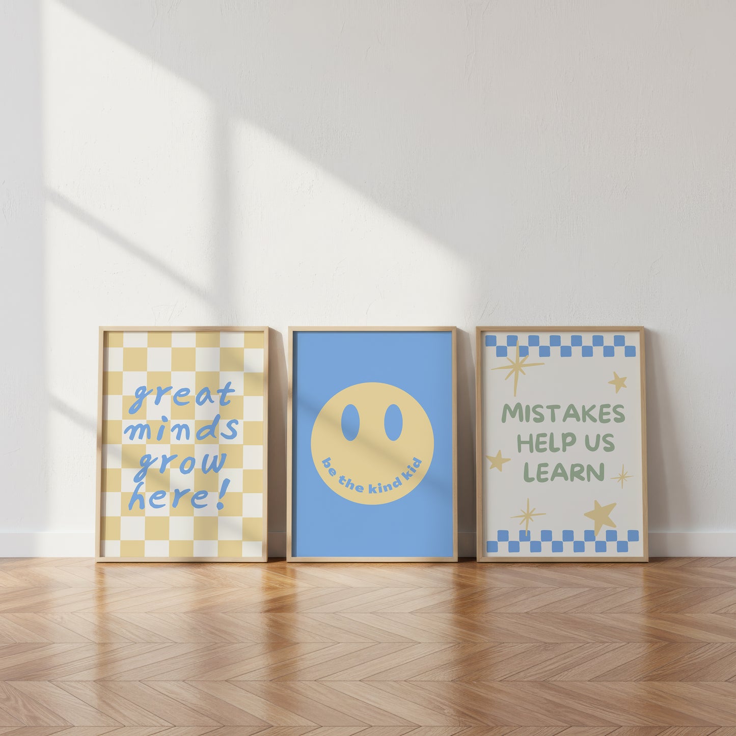 Set of 10 classroom prints in blue, green, and yellow: Yes You Can, Every Voice Matters Here, Slow Down You're Doing Fine, Progress Over Perfection, a starburst Welcome illustration, an Attendance Check print reading Show Up As You Are, Great Minds Grow Here on a checkered background, a smiley face reading Be the Kind Kid, Mistakes Help Us Learn, and Great Things Come to Those Who Try.