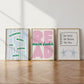 Set of 3 pastel classroom prints: "Teamwork makes the dream work" in green lettering on blue stripes, "READ more books" in pink bubble letters with green script, and "Be Kind Be Brave Be You" on a hand-drawn notebook page above two smiling star characters holding hands.