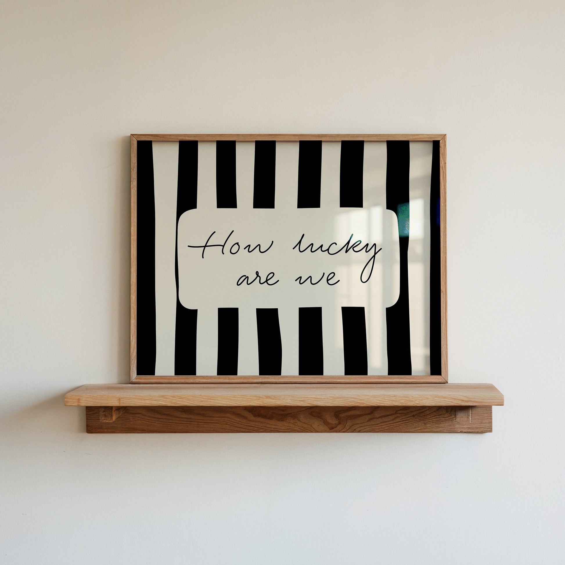 Set of 3 vintage fashion editorial prints: a photograph of two hands clinking martini glasses garnished with cherries, "I'm nicer when I like my outfit" in a scalloped oval frame, and "How lucky are we" on bold black and white stripes.