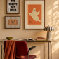 Set of five Halloween prints featuring a ghost postage stamp, bold newspaper-style lettering, a spooky season banner, a trick-or-treat ticket, and a jack-o'-lantern skeleton