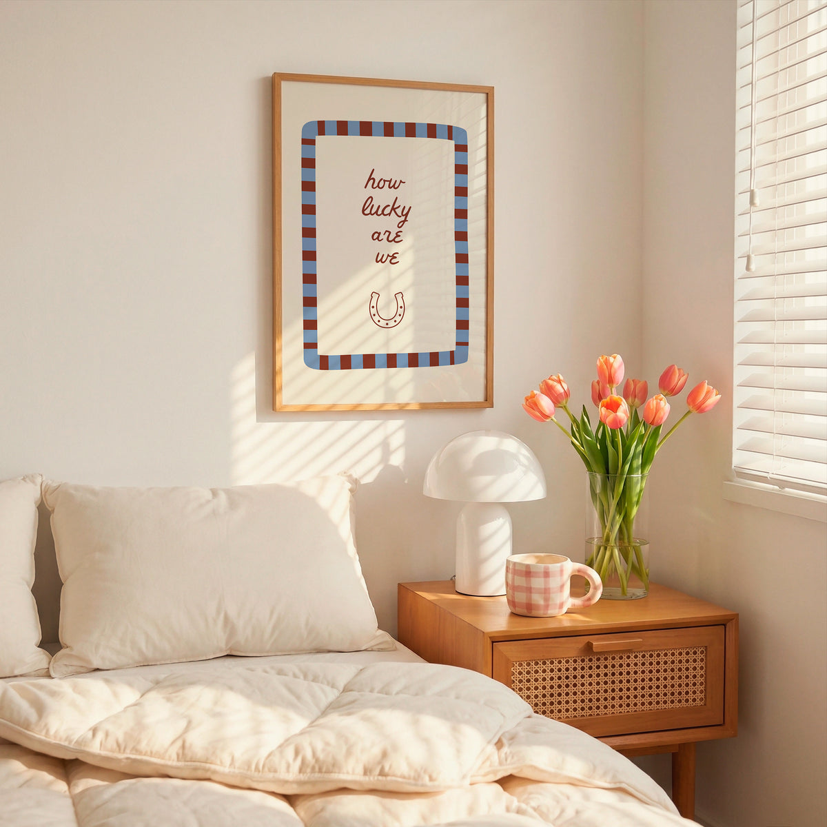 Set of five prints in rust and dusty blue: "How lucky are we" with a horseshoe, "So happy you are here," "What's for dinner?" in a checkered border, "This feels like home" on stripes, and a floral illustration
