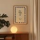 Cream print with a black dashed border featuring the handwritten quote 'how lucky are we' and a horseshoe illustration