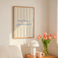 Square digital print with a cream background and blue vertical stripes, featuring the phrase "everything is figureoutable." in blue script centered on the design.